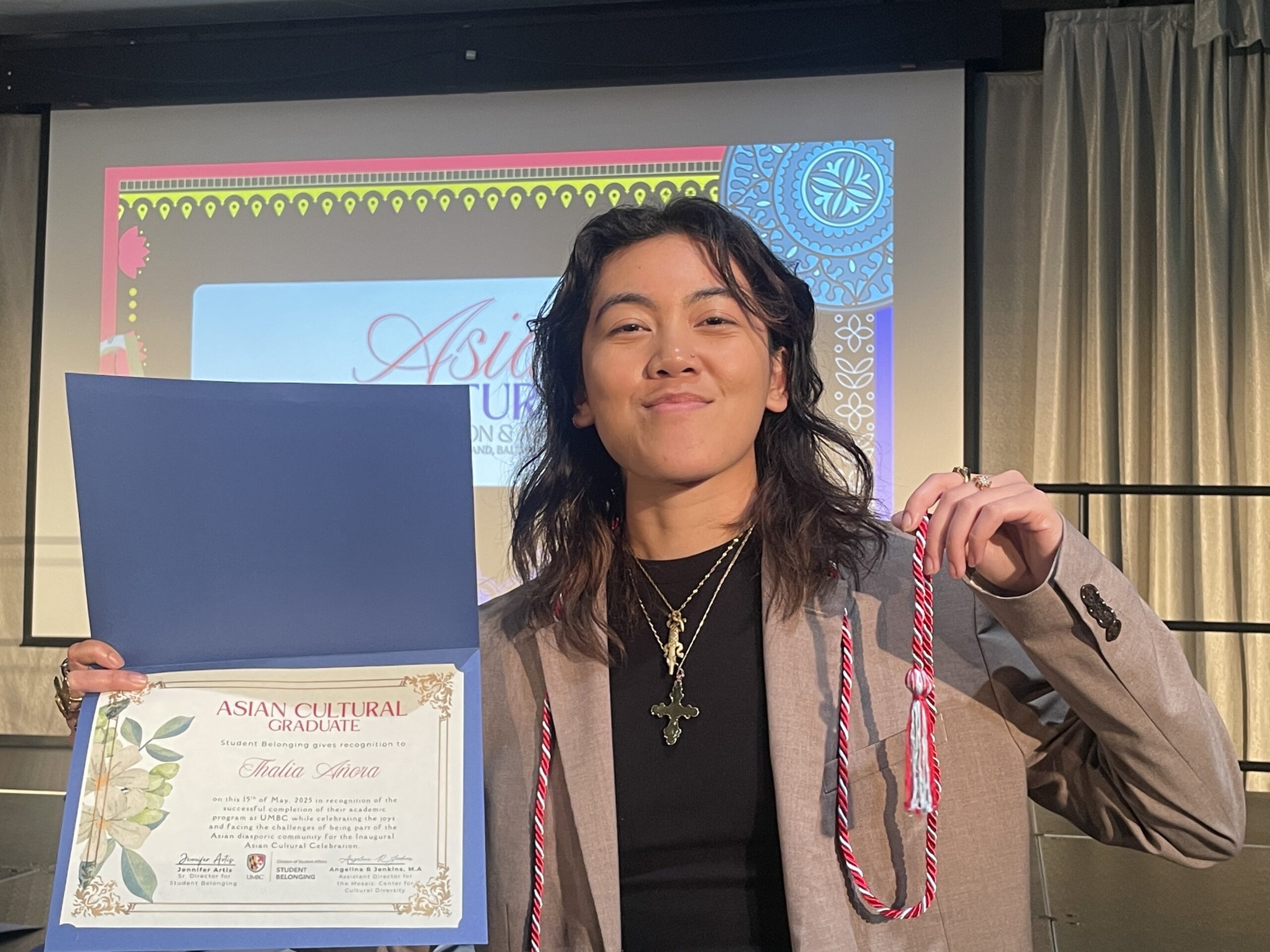 Thalia with a Panamanian add ink on their arm