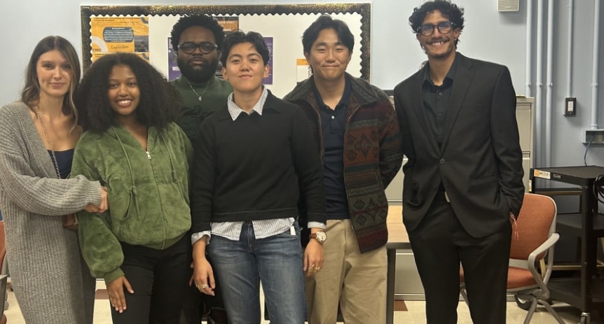 Thalia Anora with their research team in the classroom